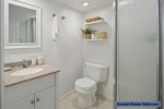 Chic master ensuite features a frosted glass shower -provides privacy-